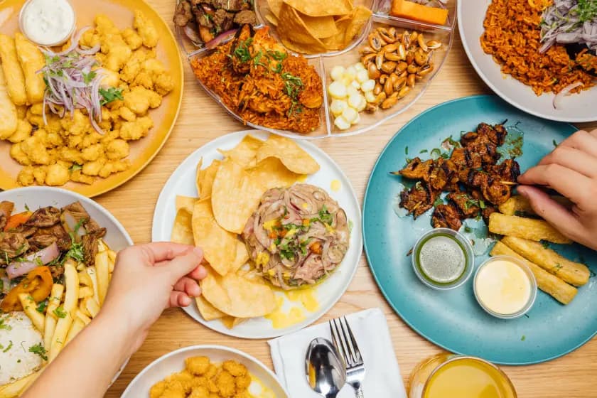 A spread of CVCHÉ dishes on a table