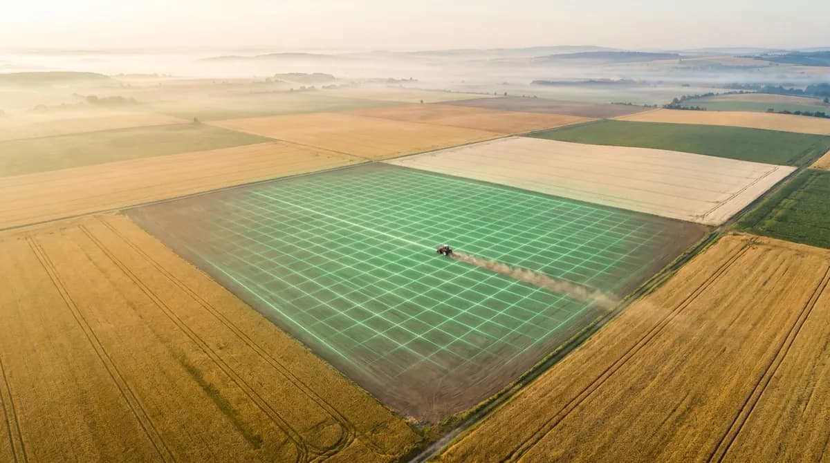 Farmland seen from above with a soft grid over one field, from the 180 AgPros case cover